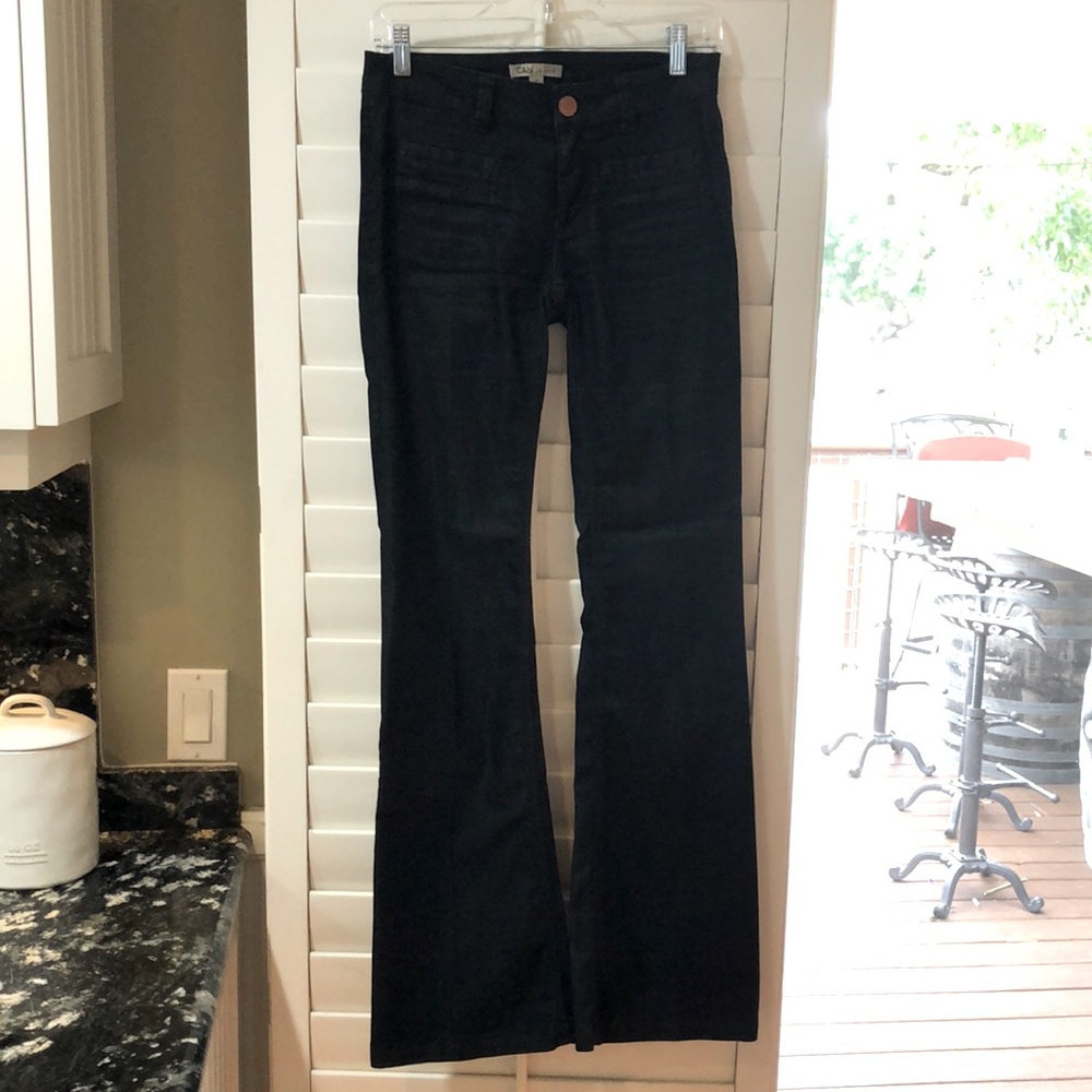 #146 cabi Farrah Jean long. From the crotch to the hem it measures 33”